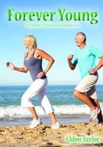 Happy couple running on a beach. Album cover for Forever Young.