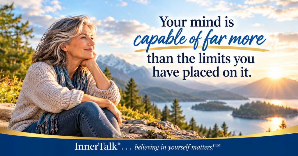 Silver-haired woman sitting thoughtfully above a mountain lake at sunset. Text reads Your mind is capable of far more than the limits you have placed on it. InnerTalk branding appears at the bottom.