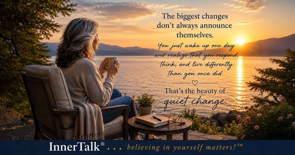 Woman with silver-streaked hair sitting beside a lake at sunset, reflecting quietly with a journal nearby. Text describes how meaningful personal change can happen gradually.